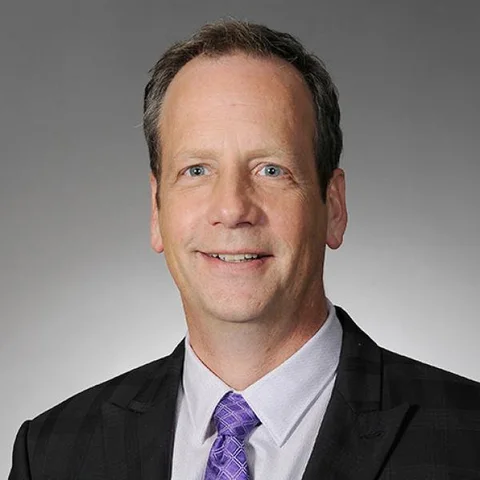 Portrait of John Orlikow